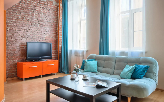 V Tsentre Goroda Apartments