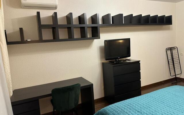 Na Panfilova 25 Flat