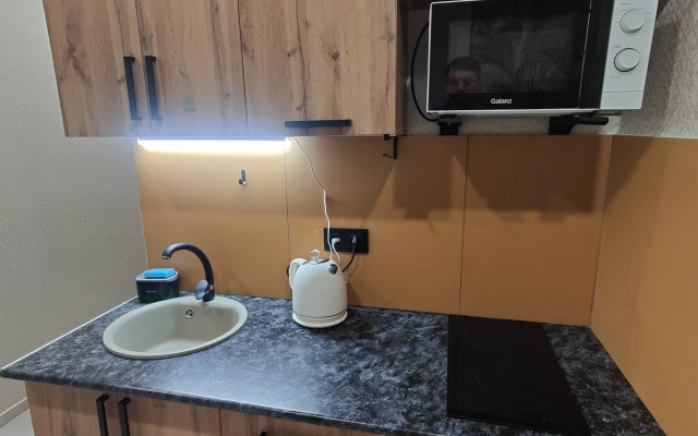 Апартаменты Уютная студия напротив университета и парка в центре Нефтяников