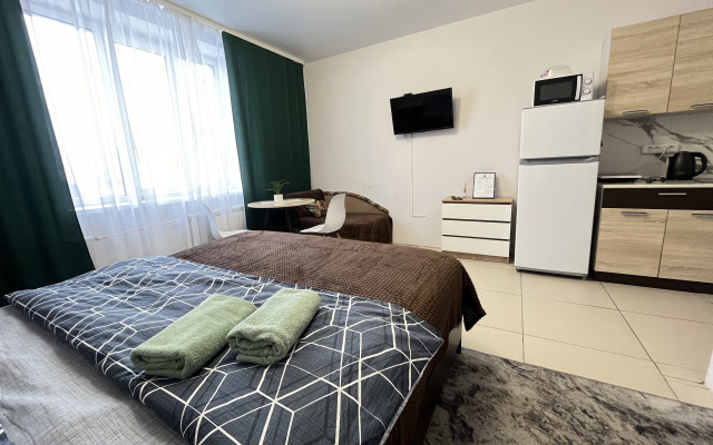 Апартаменты студия NHome Изумрудный город