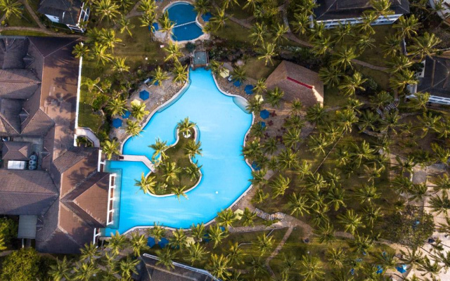 Отель PrideInn Flamingo Beach Resort & Spa