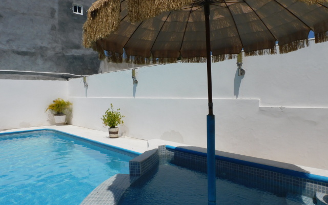 Отель Casa de Huespedes Nayomi By Rotamundos