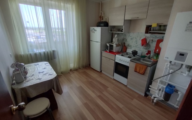 V Novom Dome Flat