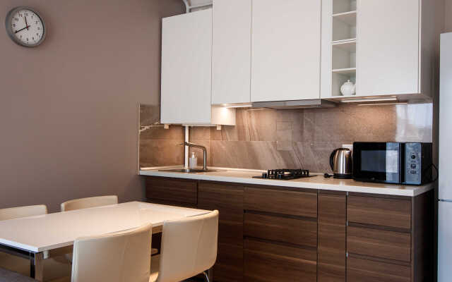 Studiya s balkonom Apartments