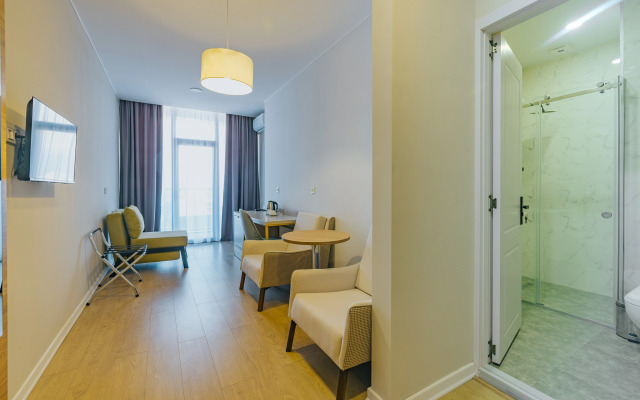 Komunna Luxe Apartment Hotel