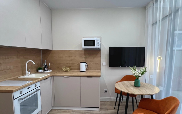 TopHouse na Strelkovoy 18k2 Apartments