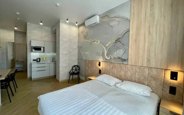 Апартаменты В Гости! на Запорожской 69 (студия 6 с Джакузи)