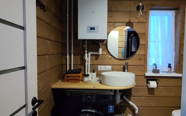 Частный дом Чёрный домик у озера Отрадное