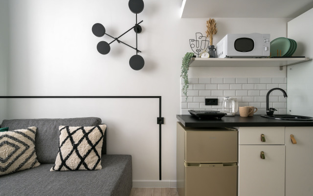 Uyutnaya Dvukhurovnevaya Studiya V Tsentre Apartments