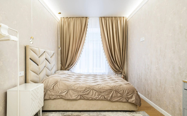 V Tsentre s Parkovkoy Flat