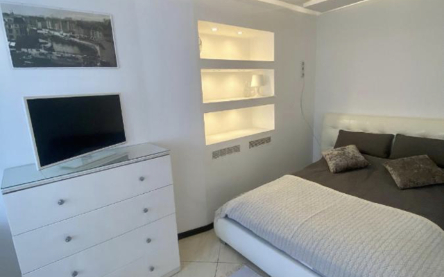 Апартаменты Уютная современная квартира в историческом центре города