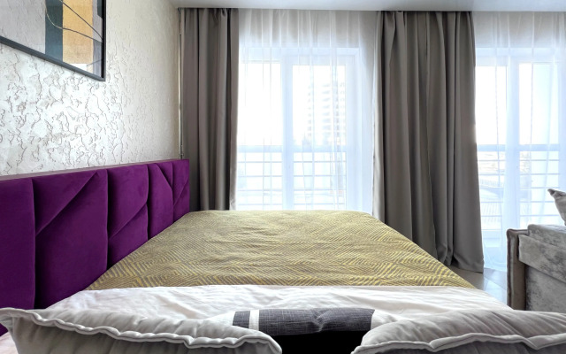 Studiya U Samogo Berega Reki Apartments