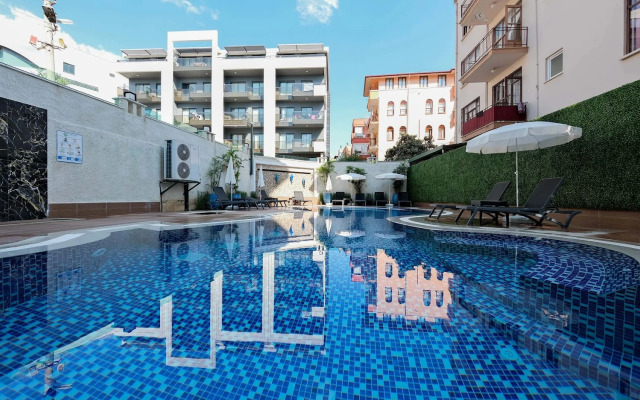 Апартаменты 1+1 Qoople Triumph 17  рядом с пляжем Клеопатры — отличный вариант для семейного отдыха