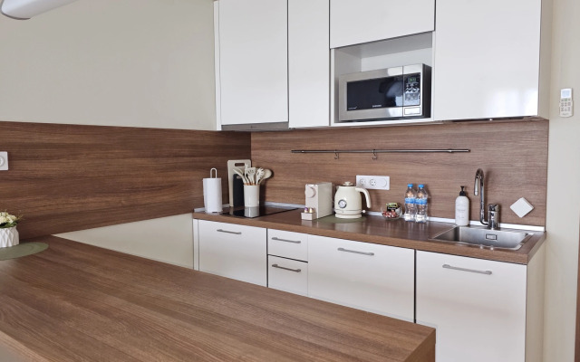 Апартаменты Стильная студия Riva на 12 этаже