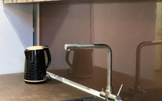 Апартаменты-студия улучшенная с кроватью двуспальным диваном и гардеробной 2 этаж