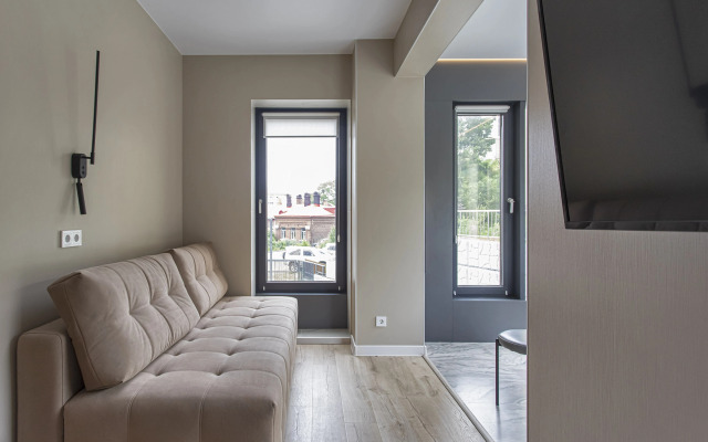 V Tsentre Goroda Apartments