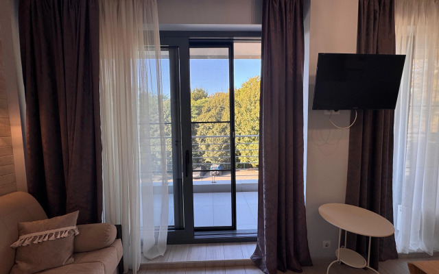 U morya s balkonom Sochi pos. Dagomys Apartments