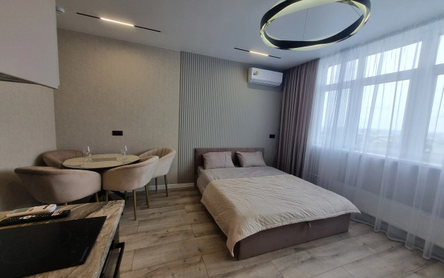 Uyutnye s Dizaynerskim Remontom Pr. Oktyabryskiy 30B Apartment