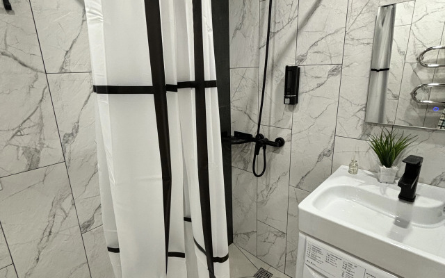 Апартаменты Уютная студия напротив Парка и Университета в центре Нефтяников