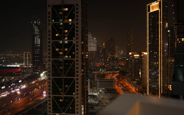 Апартаменты Exclusive Paramount 2BR - Skyline & Game Nights