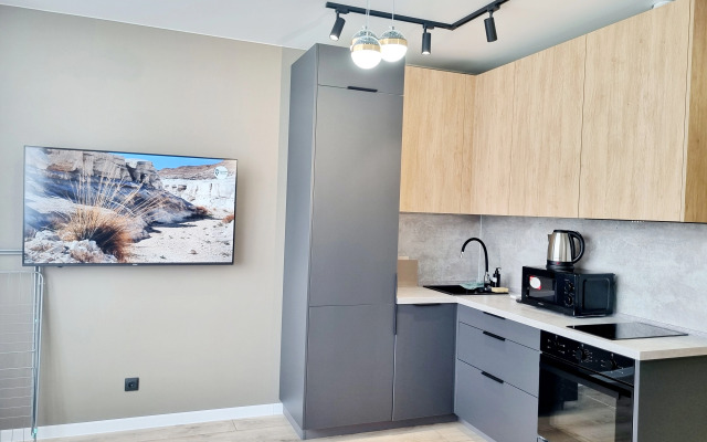 S Dizaynerskim Remontom na Pr. Oktyabryskiy 30B Apartment