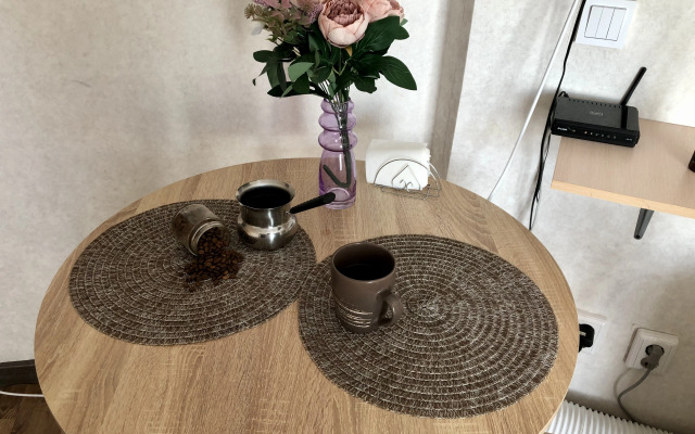 Barista V Akadem Riversaid Apartments