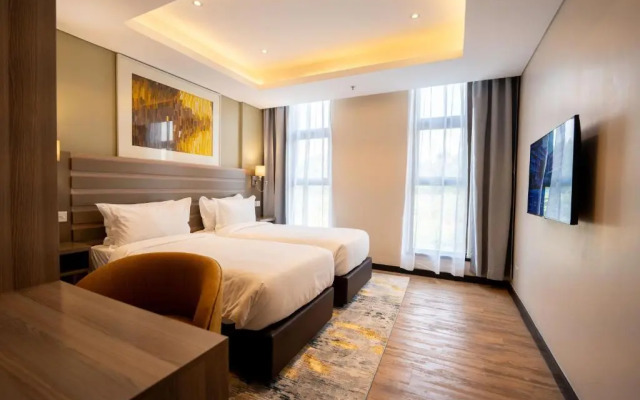 Отель Trademark Suites at Enaki Town