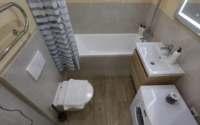 V Tsentre Goroda Apartments