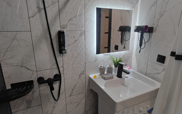 Апартаменты Уютная студия напротив Парка и Университета в центре Нефтяников