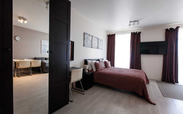 Studiya s balkonom Apartments