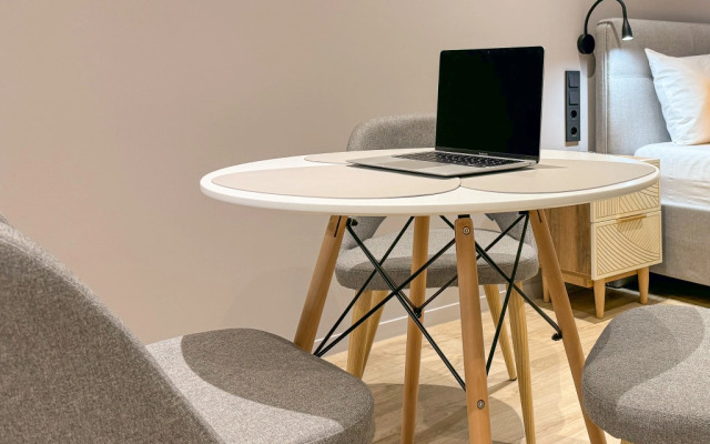 Апартаменты Трёхместные Делюкс с Видом на Город Business Apartments