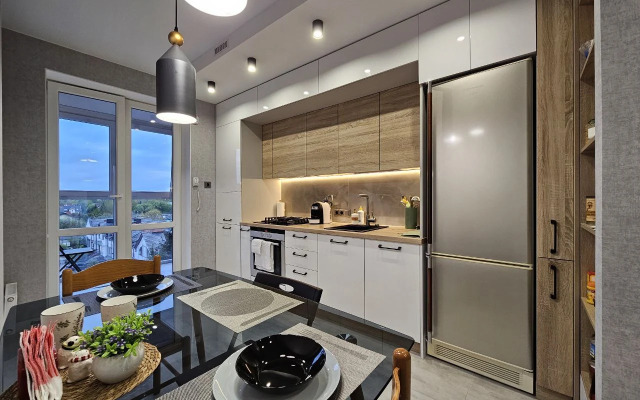 Квартира лофт над елями