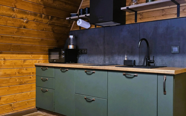 Частный дом темный А-фрейм