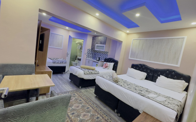 Отель Mitra Downtown