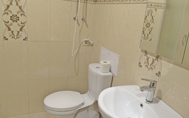 V Tsentre Goroda Apartments