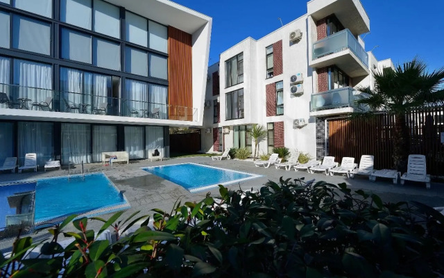 Апартаменты Уютная Студия с Бассейном в GreenPalace