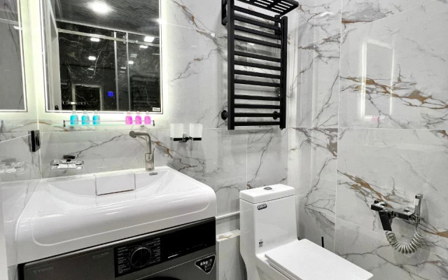 V Neboskryobe Tashkenta U-Tower 61 Apartments