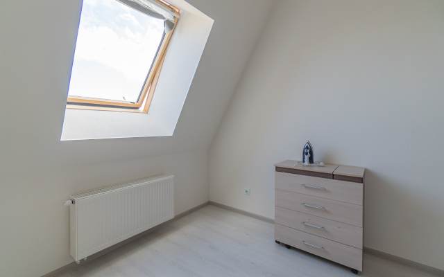 Апартаменты Двухкомнатная Квартира на Мансардном Этаже