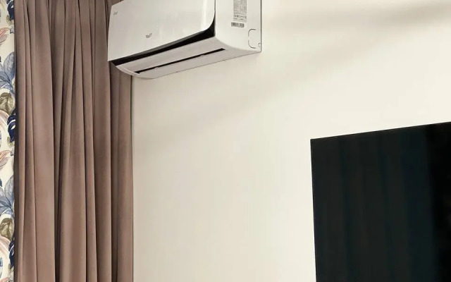 Апартаменты двухкомнатные с двумя кроватями, гардеробной и кухней-гостиной