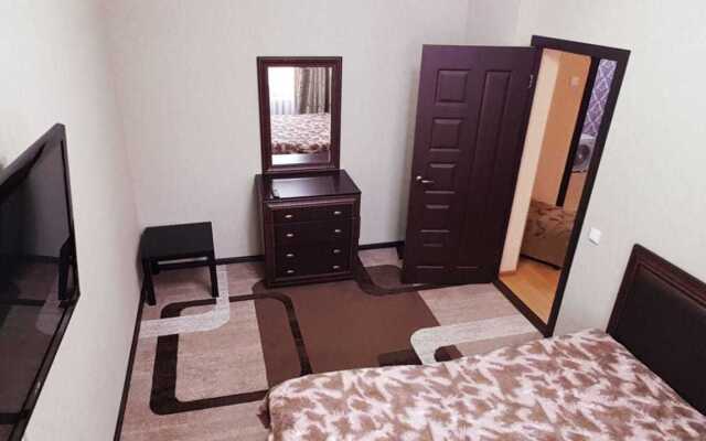 V Tsentre Goroda Apartments