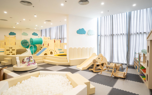 Отель The Light Beach Residences by Arena