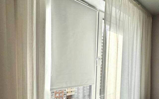 V Novom Dome Flat