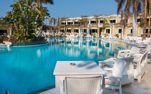 Курортный Отель Paradise Inn Beach Resort Maamoura