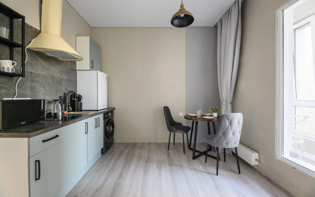 V Tsentre Goroda Flat