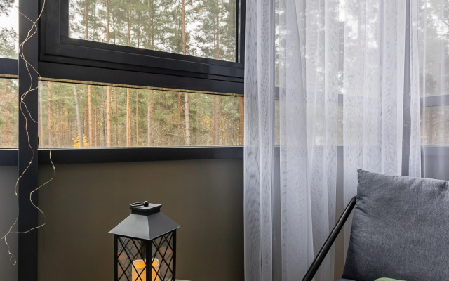 Квартира Ютно Колосья с качелью на балконе и видом на сосны в Зеленогорске