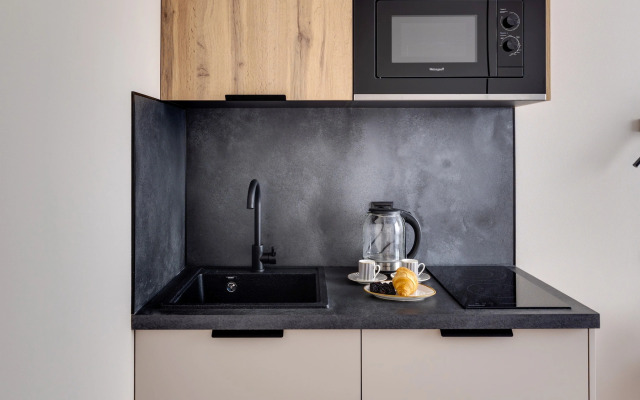 Апартаменты Уютная Дизайнерская Студия у Метро Ботанический Сад