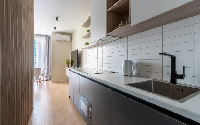 Апартаменты Уютная студия с дизайнерским ремонтом