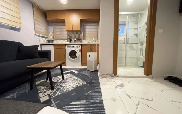 Basement With Fast WiFi And AC Apartments