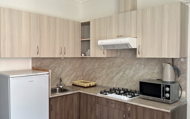 V Tsentre Goroda Apartament