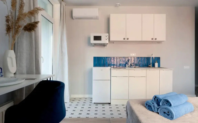 Стильная интерьерная студия 4flats Гжель в Адмиралтейском районе рядом с метро Московские ворота в ЖК Галактика Премиум для отпуска и командировки